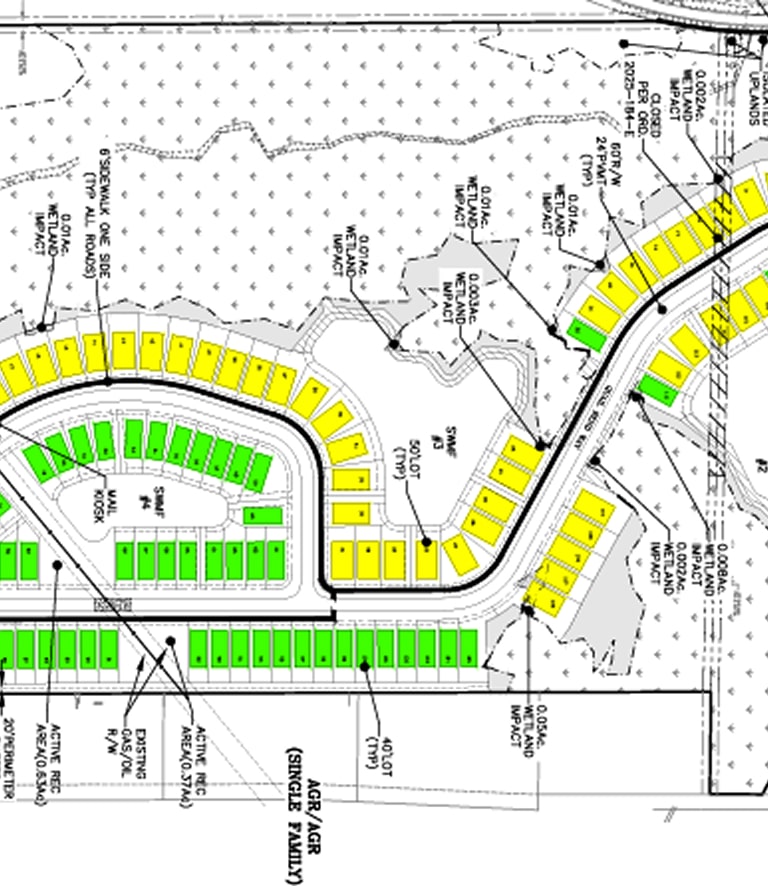 A detailed map of a residential development, showcasing the layout and infrastructure of the area. The map is divided into sections, with various features and labels providing insight into the design and planning of the development.